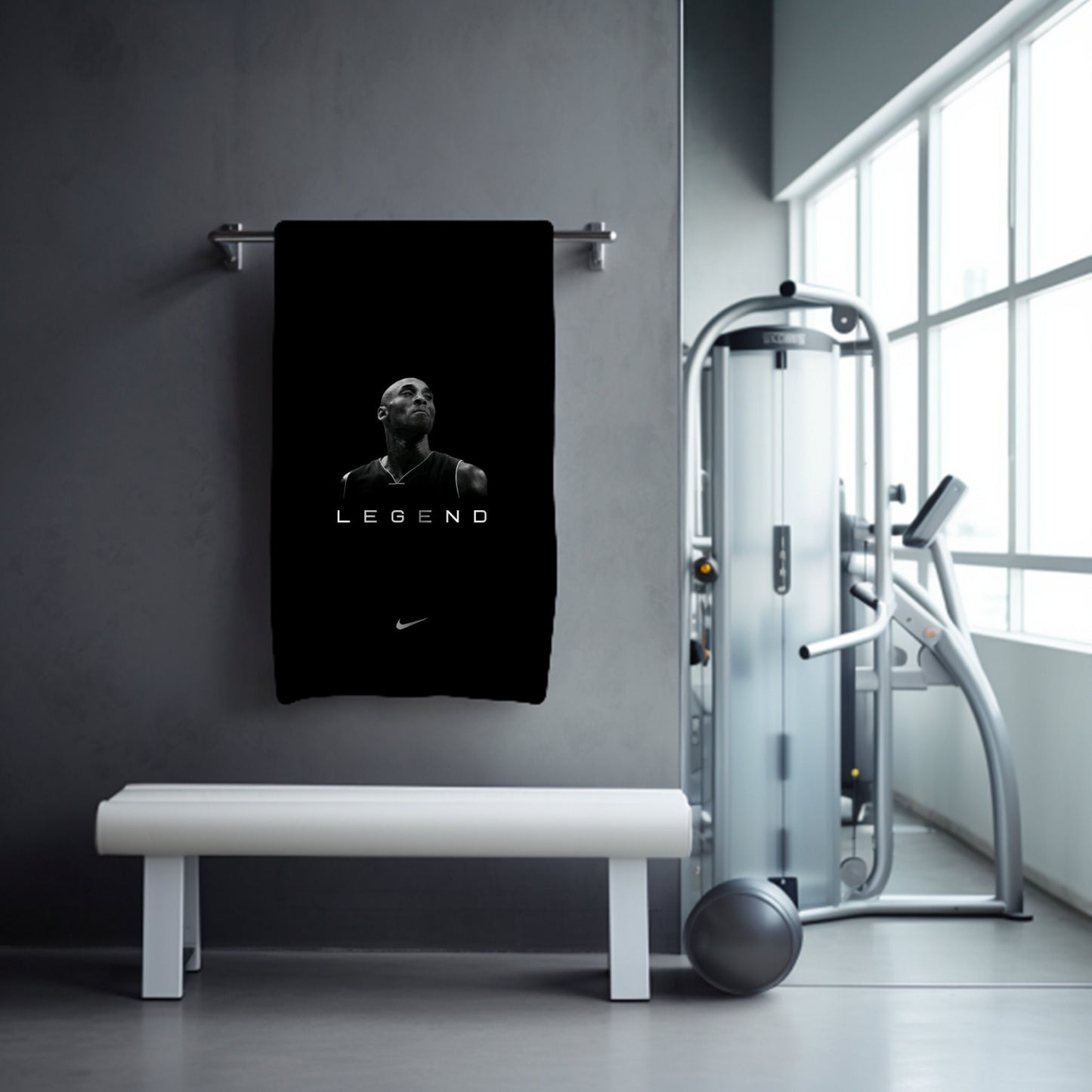 a towel hanging on a wall next to a bench