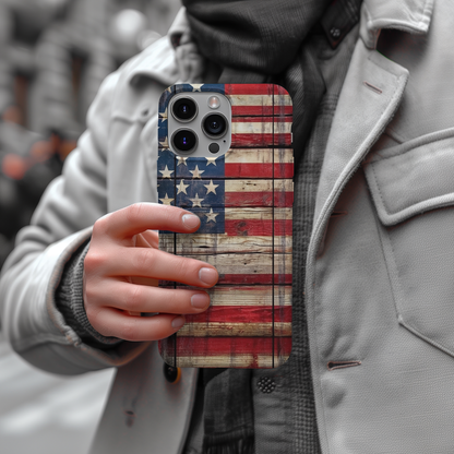 a person holding a phone case with an american flag on it