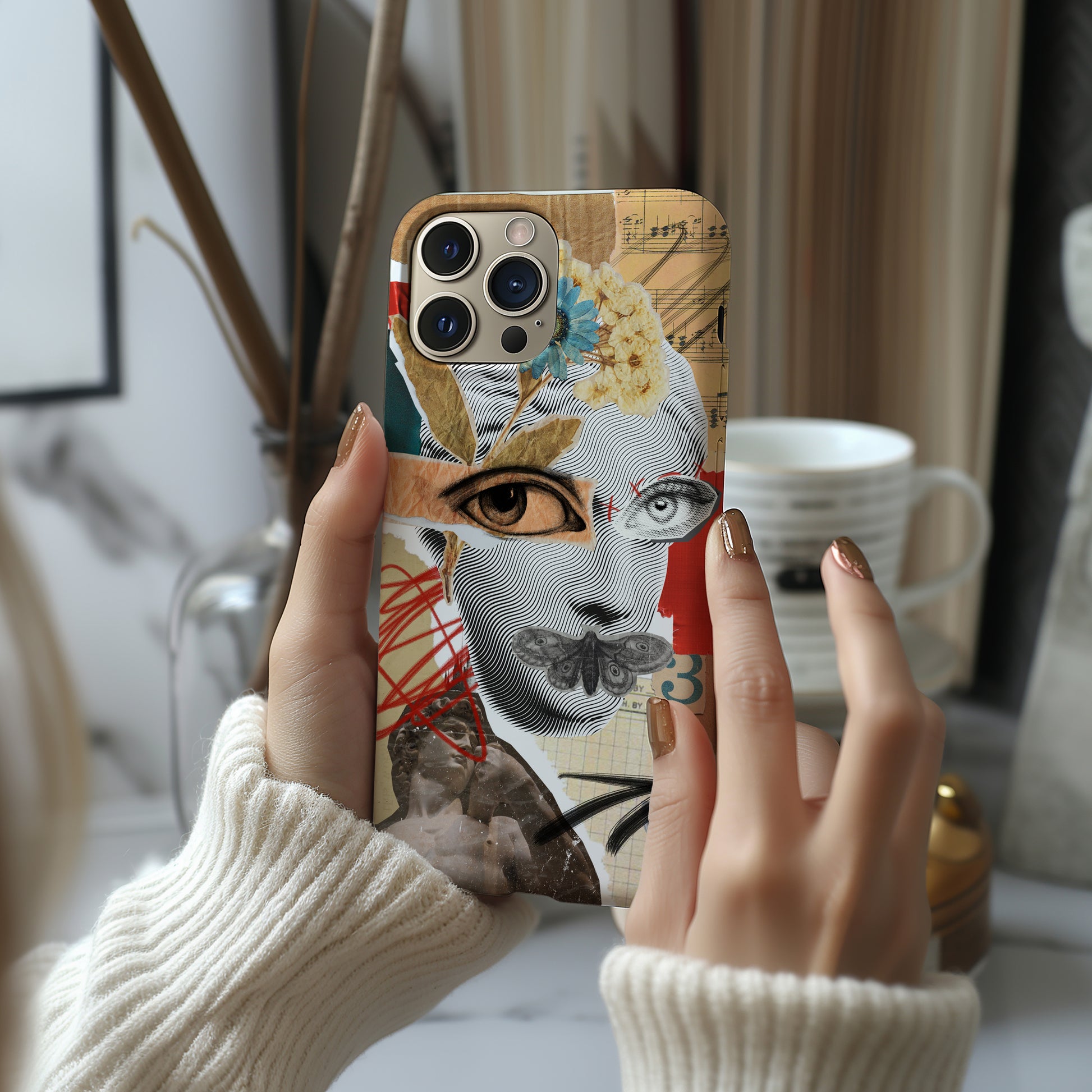 a woman holding up a phone case with a picture of a woman's face