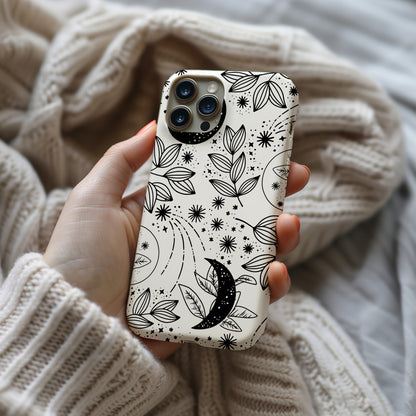 a person holding a phone case with a pattern on it